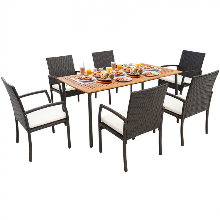 7-piece patio dining set featuring acacia wood tabletop and cushioned PE rattan chairs, perfect for outdoor gatherings.