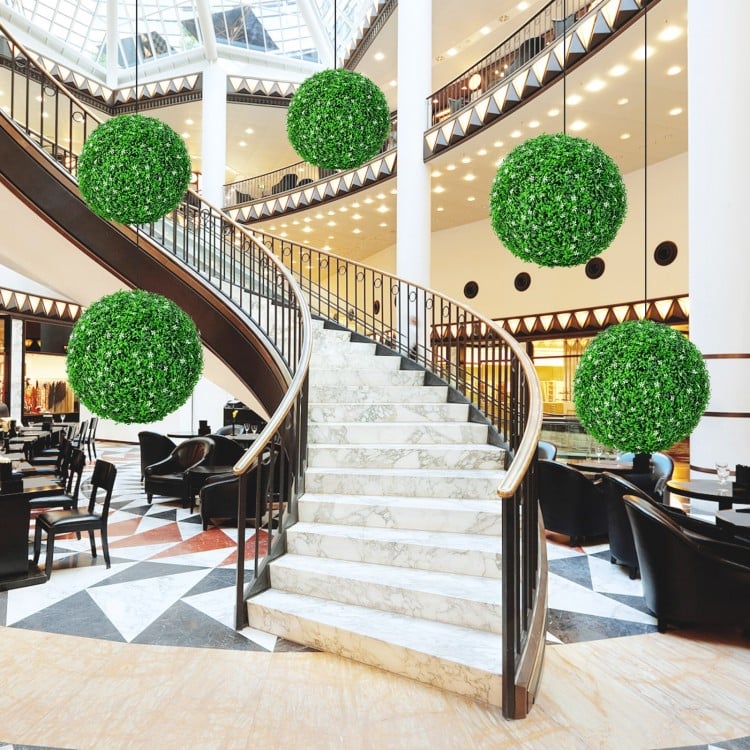 Two 19.5-inch faux boxwood topiary balls made of UV-proof PE material, enhancing indoor and outdoor spaces.