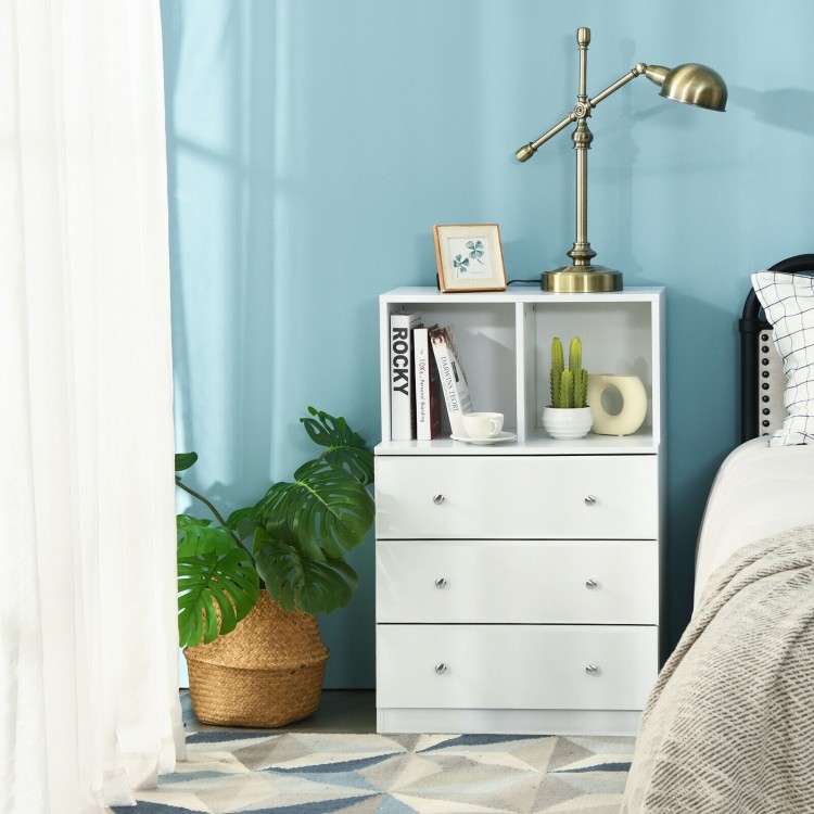 Three-drawer white dresser with cubbies, perfect for bedroom or living room storage and easy maintenance.
