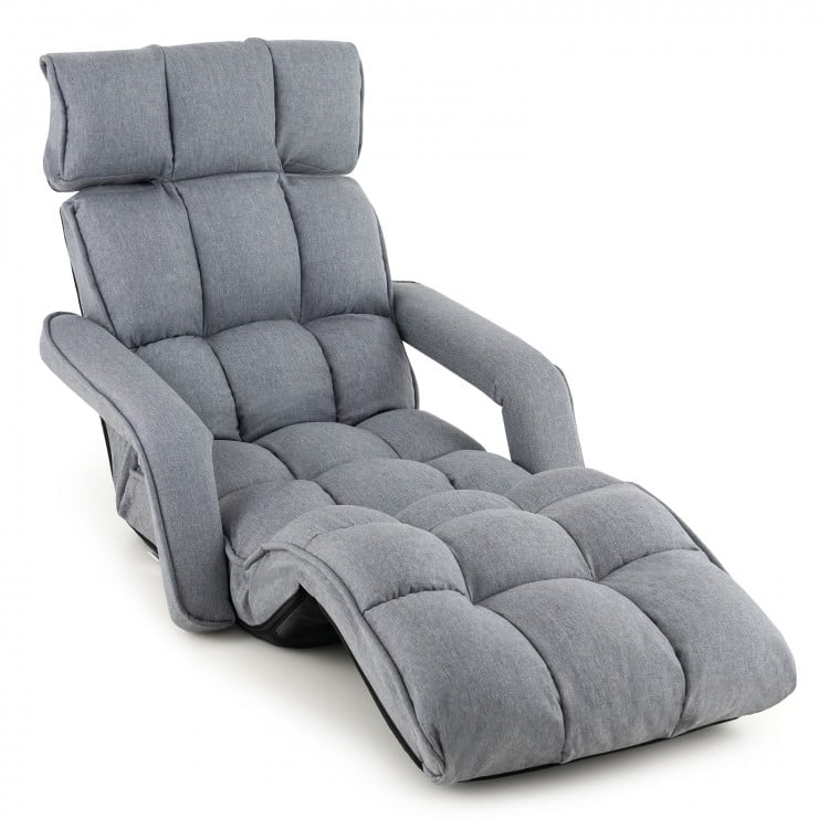 Gray floor chair with raised backrest and adjustable footrest, designed for versatile use in living rooms or guest.