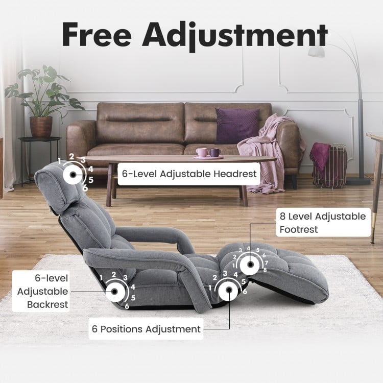 Gray 6-position adjustable floor chair with armrests and footrest, perfect for living rooms and relaxation.