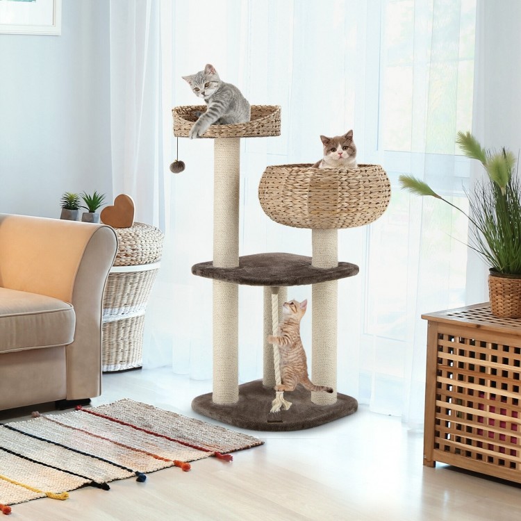 Rattan cat tree with two napping perches, sisal posts, and hanging toys, perfect for indoor cat play and relaxation.