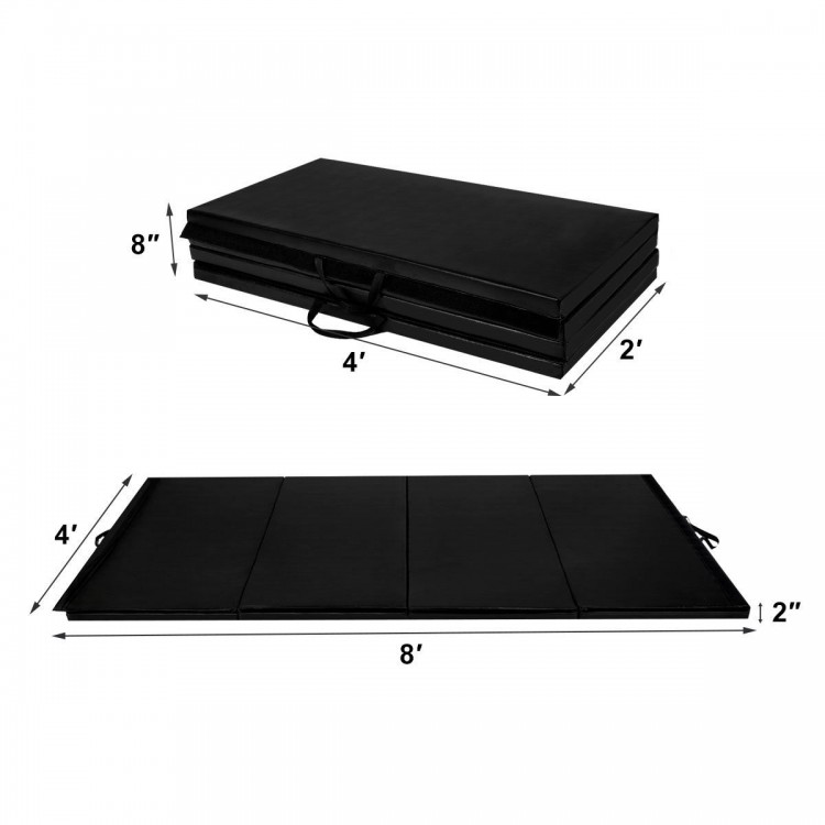 Top view of a black 4' x 8' x 2" folding gymnastics mat, showcasing its four panel design and portability for various.