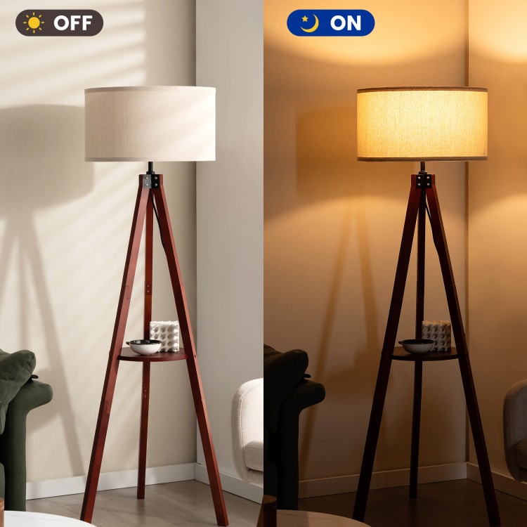 Tripod floor lamp with brown wooden base and flaxen shade, showcasing on/off light functionality for modern home decor.