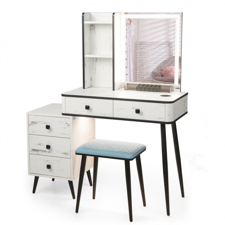Vanity makeup table set with lighted mirror, adjustable brightness, and ample storage, perfect for organizing cosmetics.