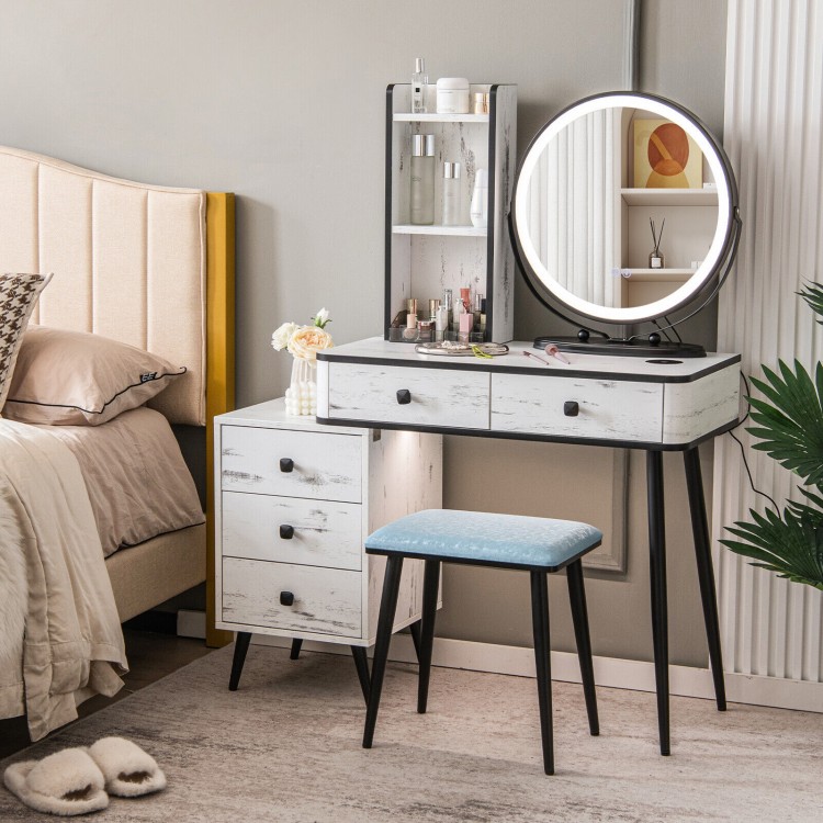 Vanity table set with 3-color lighted mirror, cushioned stool, and ample storage for cosmetics and accessories.