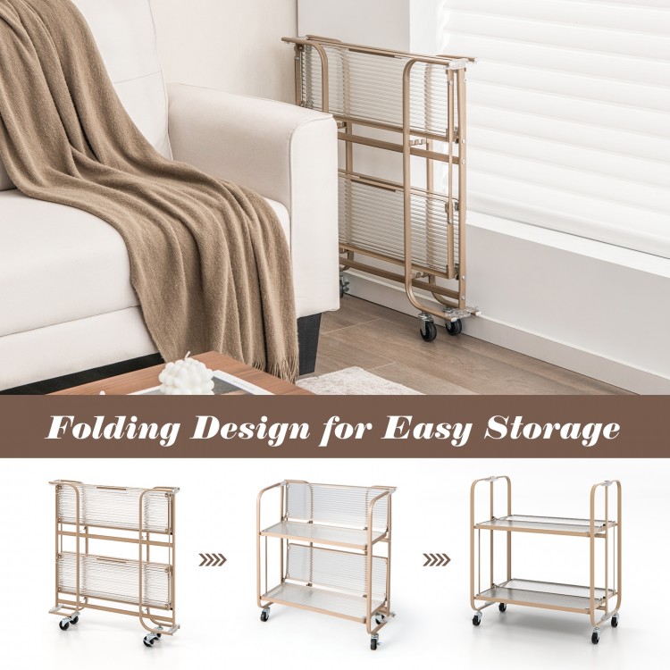 2-tier mobile serving cart with tempered glass shelves, golden metal frame, and folding design for easy storage and.