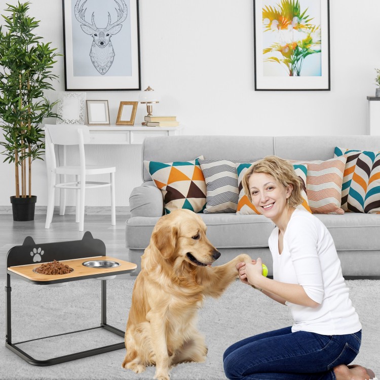 Elevated dog bowl stand with bamboo tabletop and stainless steel bowls, ideal for elder dogs in a cozy living room.
