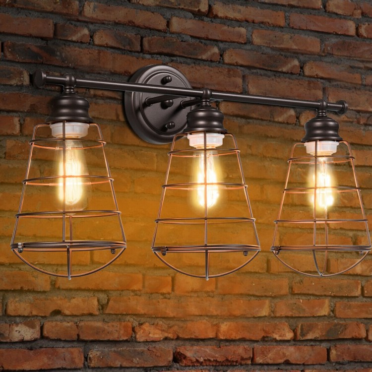 Three-light vanity lamp with metal wire cage in oil rubbed bronze finish, ideal for vintage industrial decor in.