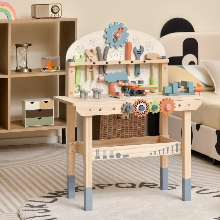 Kids play tool workbench featuring wooden tools, accessories, and a magnetic tool rack for creative play and storage.