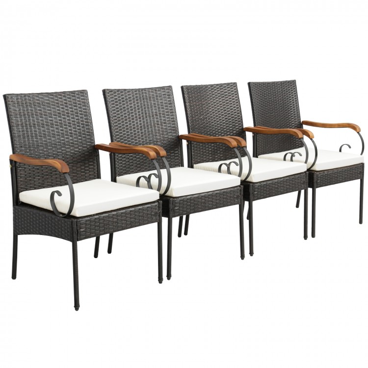 Four patio dining chairs featuring PE rattan and acacia wood armrests, ideal for backyard or poolside use.