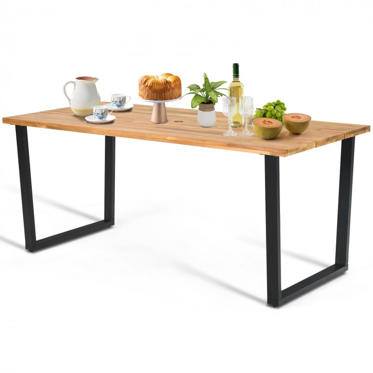 Acacia wood tabletop dining table with black metal legs, ideal for outdoor use in patios or backyards.