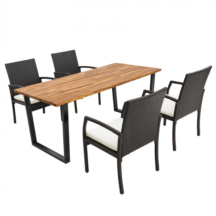 5-piece patio rattan dining set with acacia wood tabletop and cushions, featuring an umbrella hole for outdoor use.