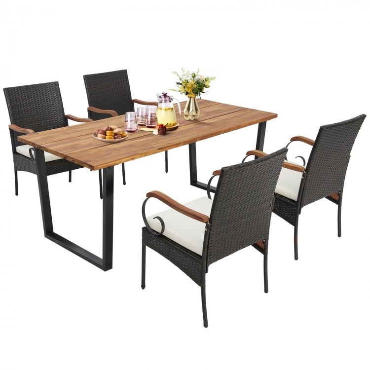 5-piece patio rattan dining set with acacia wood tabletop and ergonomic chairs, perfect for poolside or backyard dining.