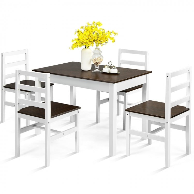 Compact 5-piece walnut dining set with pine wood table and chairs, featuring cushioned seats and space-saving design.