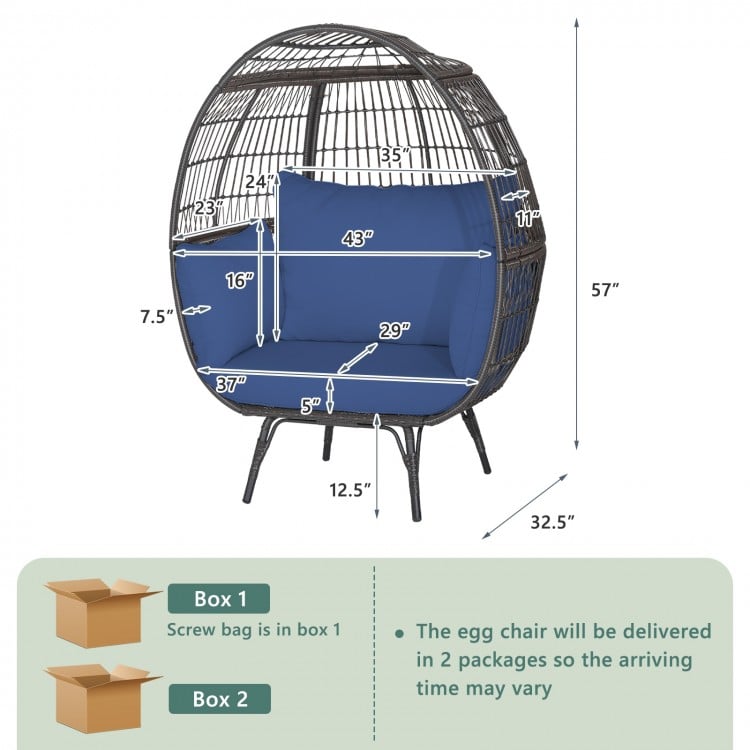 Dimensions of oversized patio rattan egg lounge chair with navy cushions, showcasing its spacious design for ultimate.