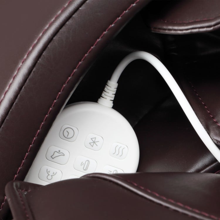 Remote control for the Provox 27-Comfort 2D Full Body Massage Chair stored in a side pocket, featuring heating and.