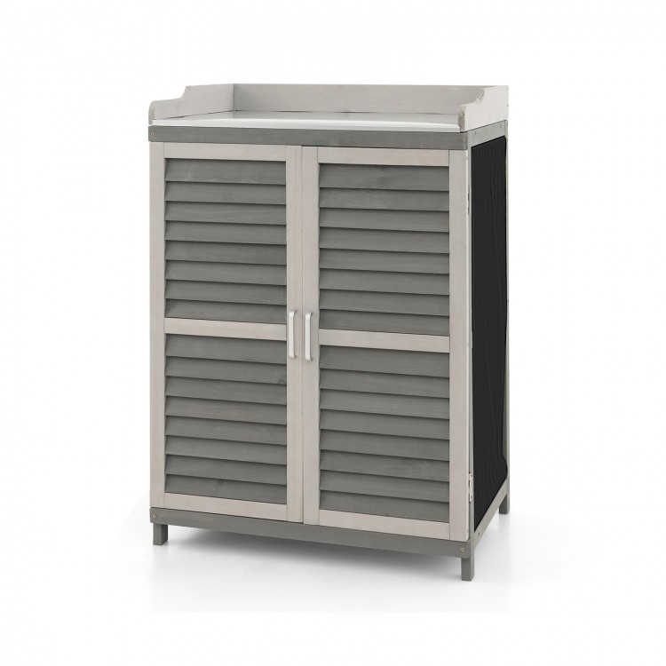 Garden potting bench table in gray with vented shutter doors, metal tabletop, and two storage shelves for versatile use.