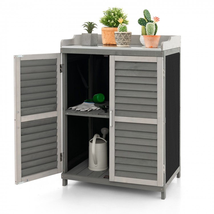 Garden potting bench table in gray with elevated legs and a unique roll-up door, perfect for ventilation and easy.