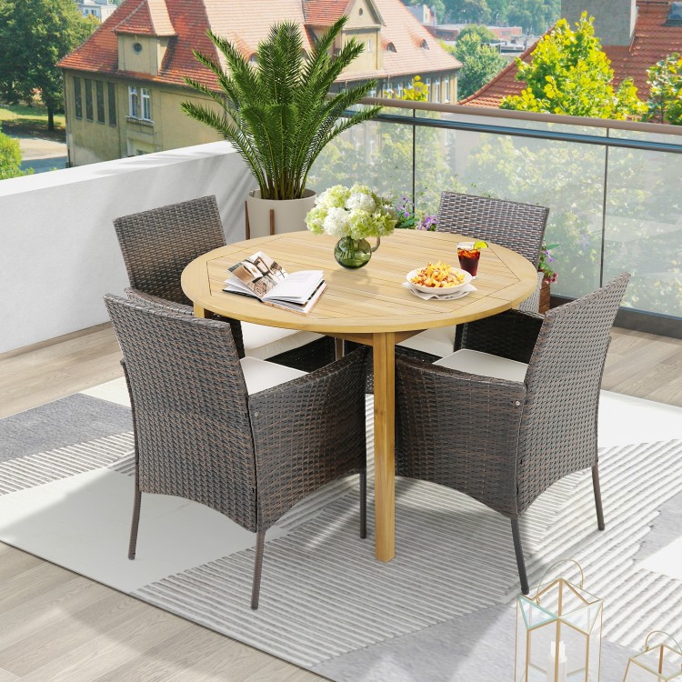 Set of 4 patio dining chairs with ergonomic design, soft cushions, and durable PE wicker, perfect for outdoor dining.