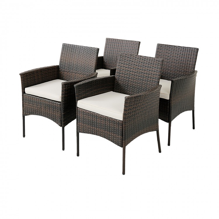 Set of 4 patio PE wicker dining chairs with soft cushions and armrests, ideal for backyard or poolside use.