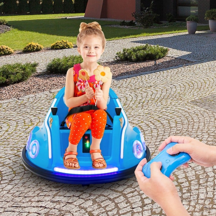 Blue 12V electric bumper car with remote control, LED lights, and a child holding flowers for outdoor fun.