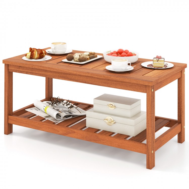 2-tier patio coffee table made of solid wood with slatted tabletop and bottom shelf, perfect for indoor and outdoor use.