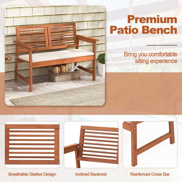 2-person solid wood patio bench with backrest and cushion, featuring a breathable slatted design for backyard.