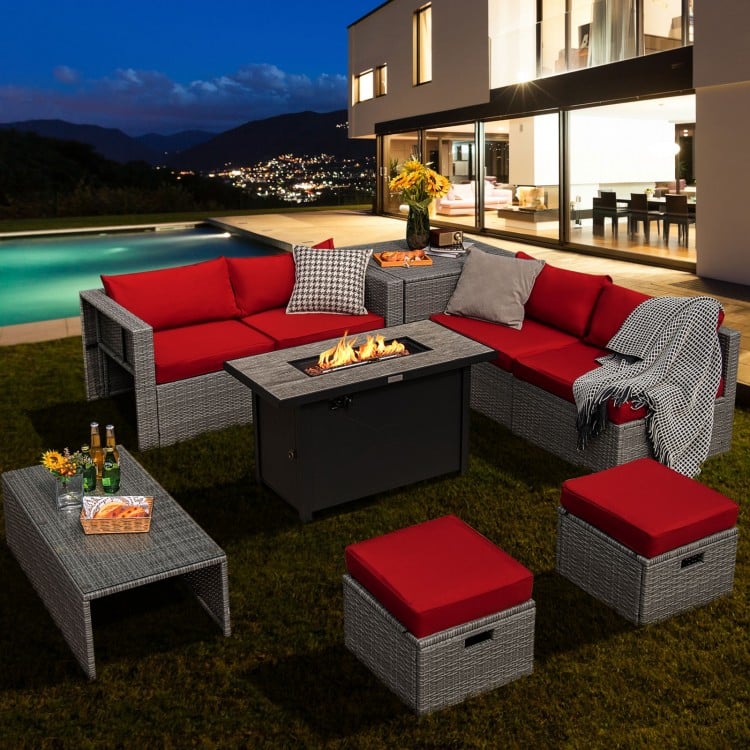 9-piece patio furniture set featuring a fire pit table, red cushions, and hand-woven PE wicker for outdoor relaxation.