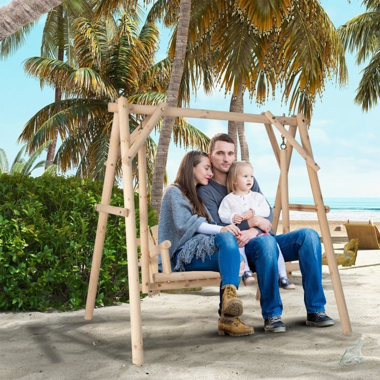 Heavy duty wooden swing frame in a beach setting, perfect for backyard relaxation and compatible with various swings.