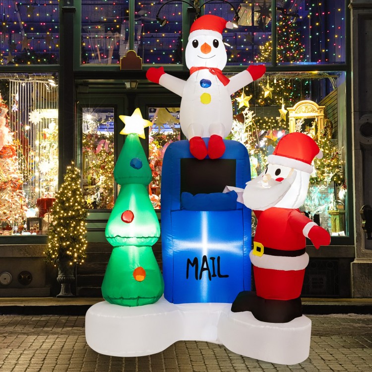 6-foot inflatable Christmas scene featuring Santa Claus, a snowman, and a tree, illuminated with bright LED lights for.