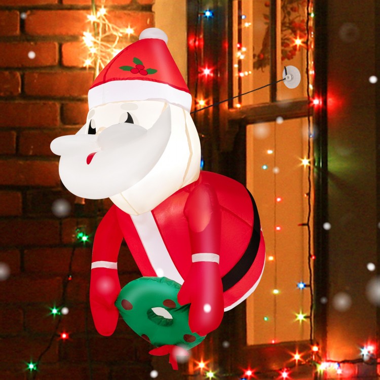 Lighted inflatable Santa Claus with Christmas hat and wreath, perfect for festive indoor or outdoor decoration.