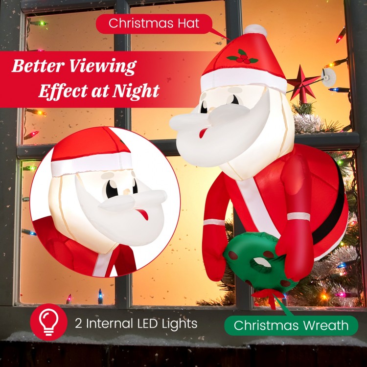 Lighted inflatable Santa Claus with Christmas hat and wreath, featuring LED lights for festive indoor and outdoor.
