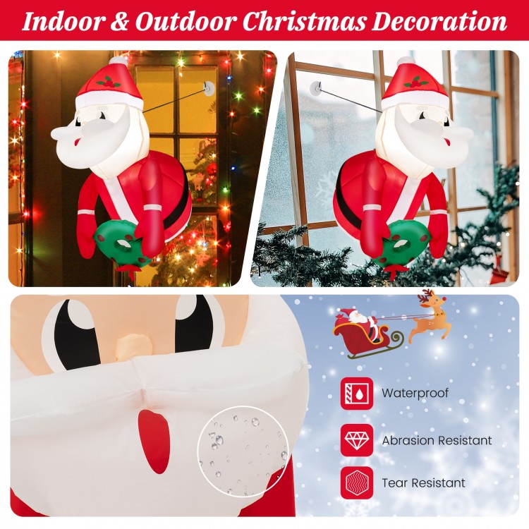 Lighted inflatable Santa Claus decoration with wreath, made of abrasion-resistant polyester, perfect for indoor and.