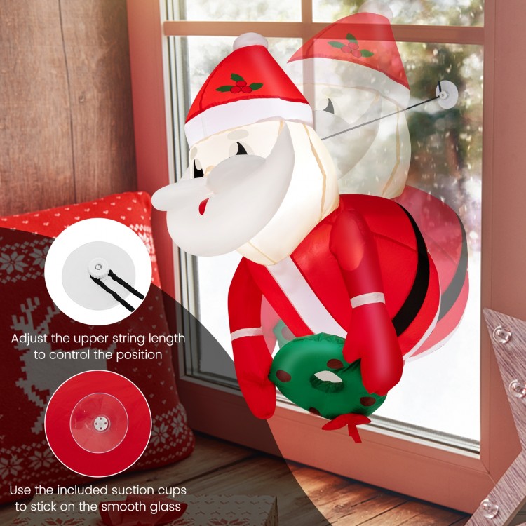Lighted inflatable Santa Claus with wreath, 3.3 feet tall, perfect for festive window decoration indoors or outdoors.