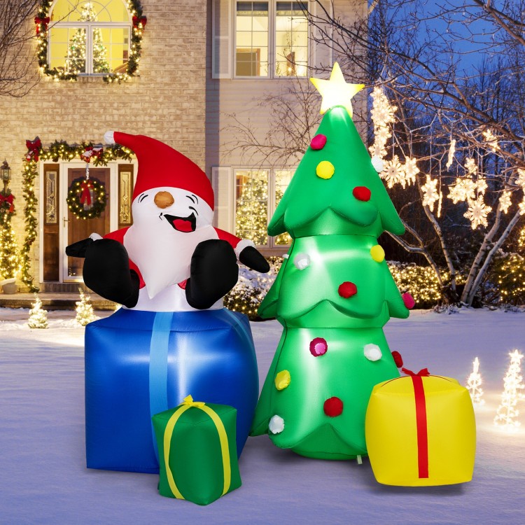 Lighted 7-foot Santa Claus and Christmas tree inflatable with gift boxes, perfect for outdoor holiday decorations.
