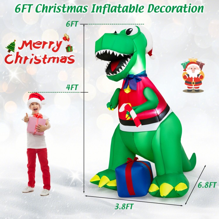 6FT inflatable dinosaur Christmas decoration with LED lights, featuring a hat and gift box, perfect for yard display.