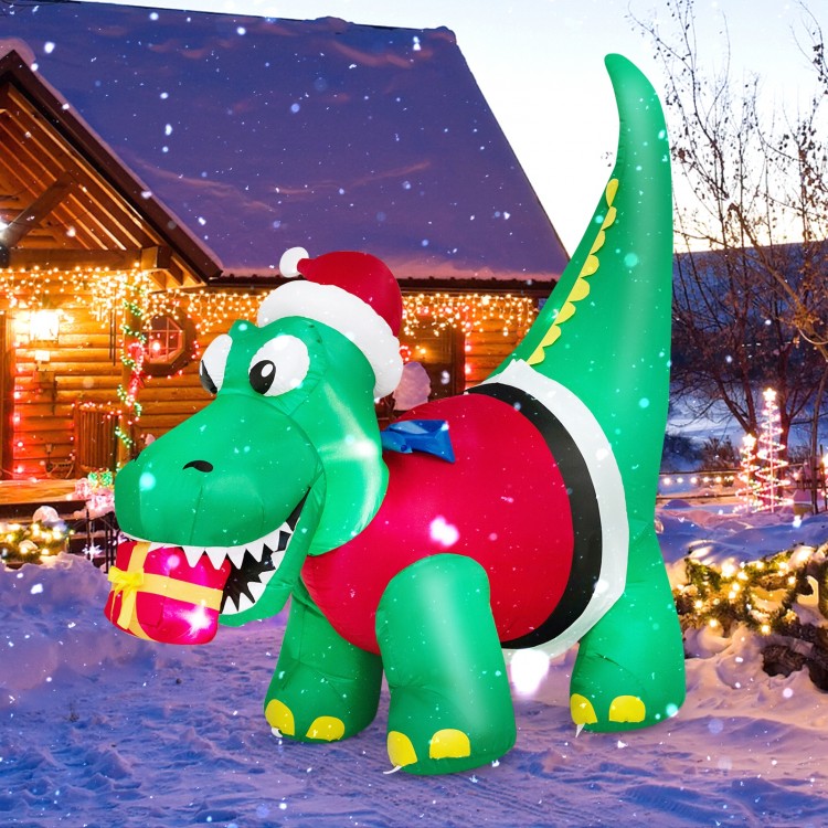 Inflatable dinosaur Christmas decoration with LED lights, featuring a Santa hat and gift box for festive outdoor.