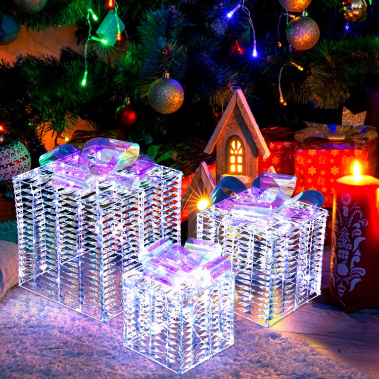 Iridescent Christmas gift box with a bow, showcasing cold white lights, ideal for enchanting holiday decoration.