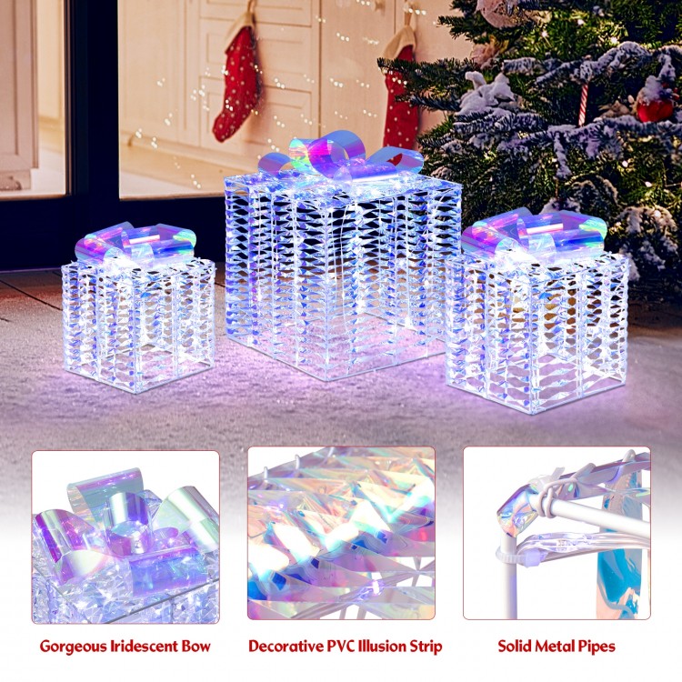 Iridescent Christmas gift box with a decorative bow, featuring sturdy metal pipes and cold white lights for festive.