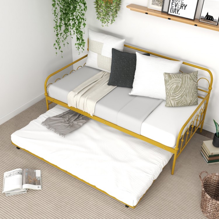 Golden metal twin size daybed with trundle, featuring lockable wheels and cushions, ideal for guest accommodations.