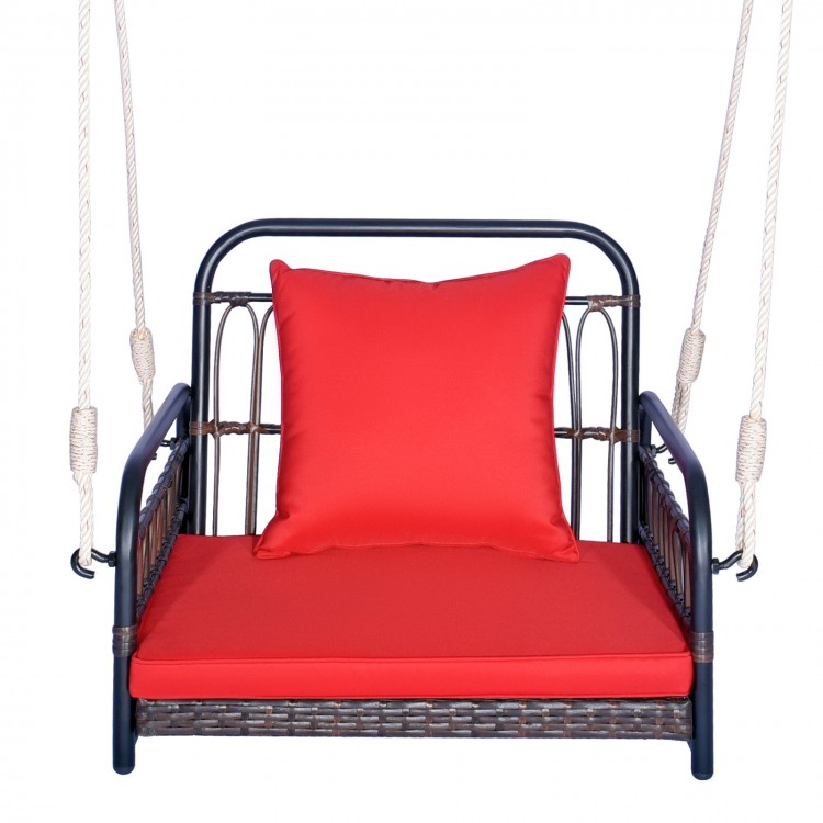 Patio rattan porch swing hammock chair with red cushion, featuring a stable metal frame for backyard relaxation.
