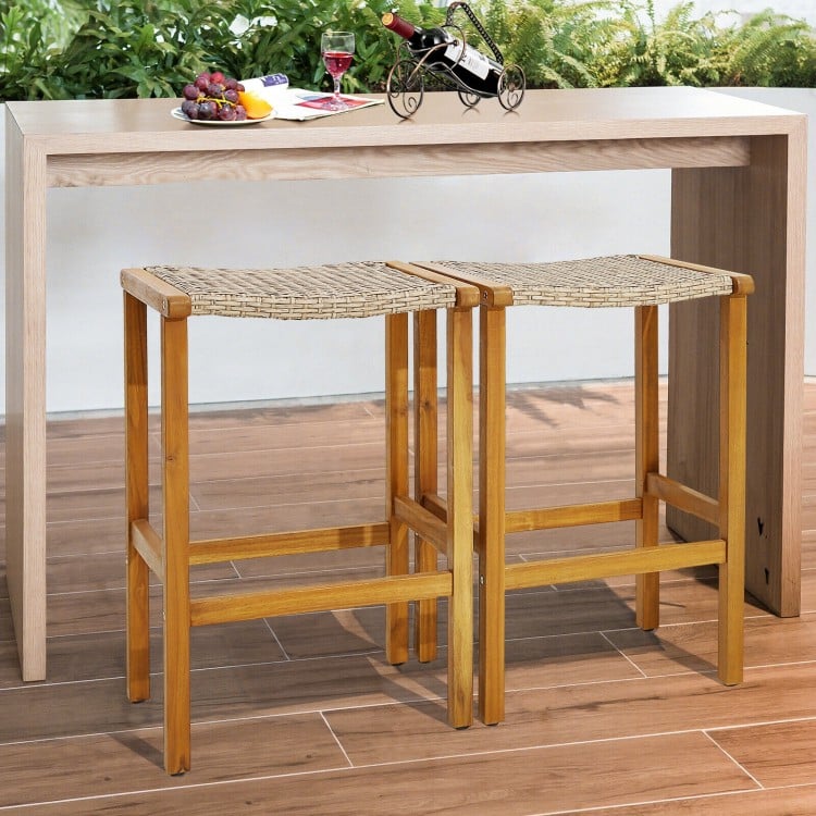 Side view of two acacia wood bar stools with woven PE rattan seats, perfect for stylish outdoor dining or entertaining.