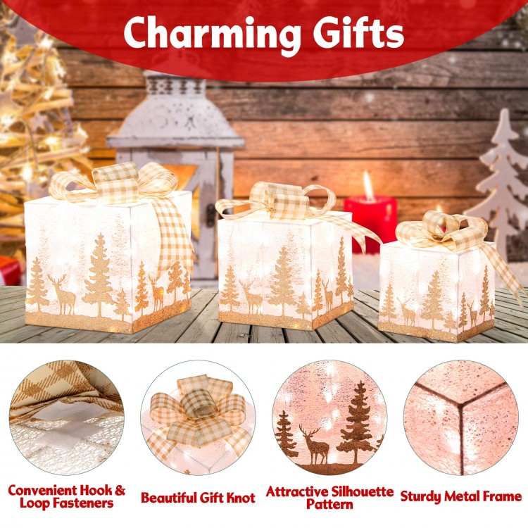 Set of 3 lighted Christmas gift boxes with warm white lights, featuring a sturdy metal frame and attractive silhouette.