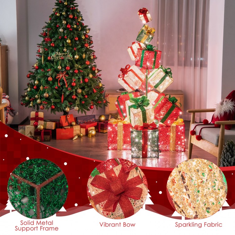 Stacked lighted Christmas gift box tower with 450 warm white lights, featuring vibrant bows and a solid metal frame for.
