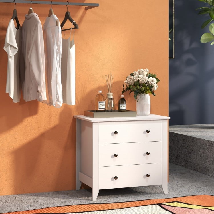 Three-drawer white dresser chest with modern design, ideal for bedroom storage and easy access to essentials.