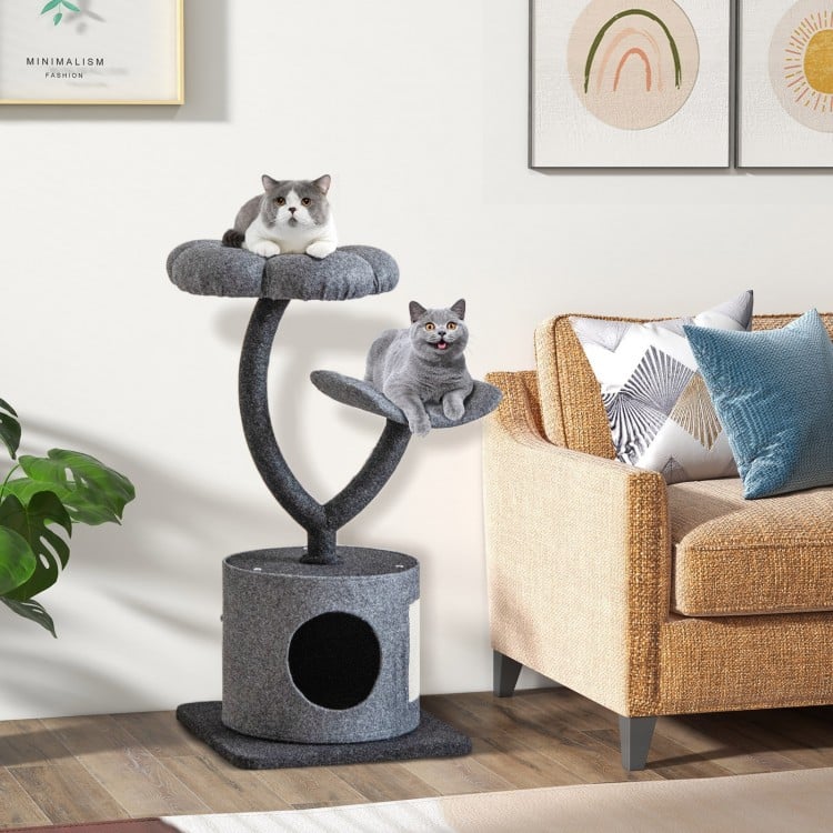 Gray cat tree showcasing a private condo and dangling ball, designed for cats to relax, play, and scratch comfortably.