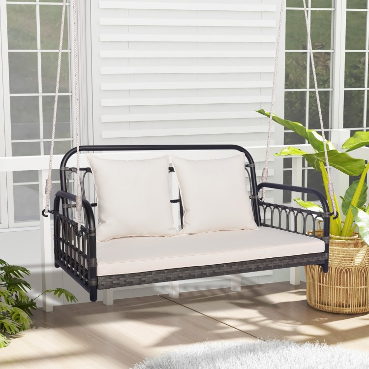 Two-person outdoor hanging chair in gray with soft cushions, suitable for porch or garden, featuring durable PE wicker.