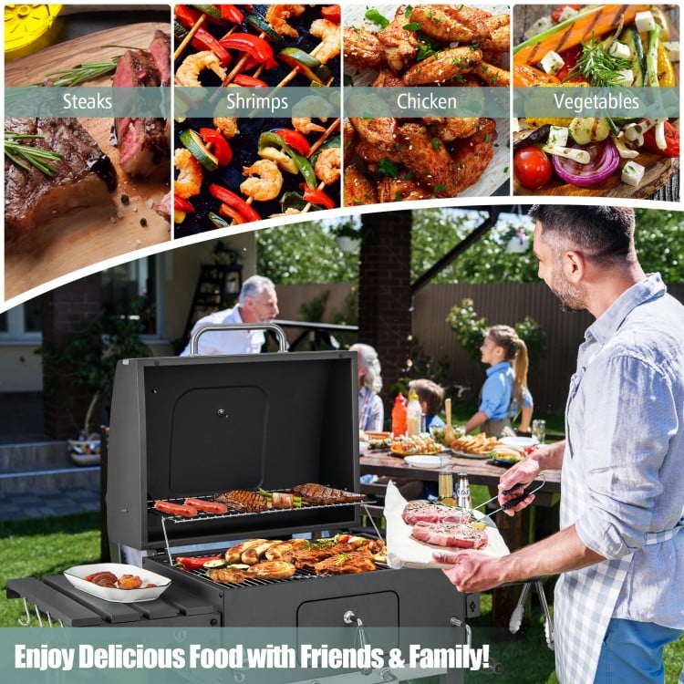 Outdoor BBQ charcoal grill with foldable side tables, large cooking area, and wheels for easy transport and grilling.