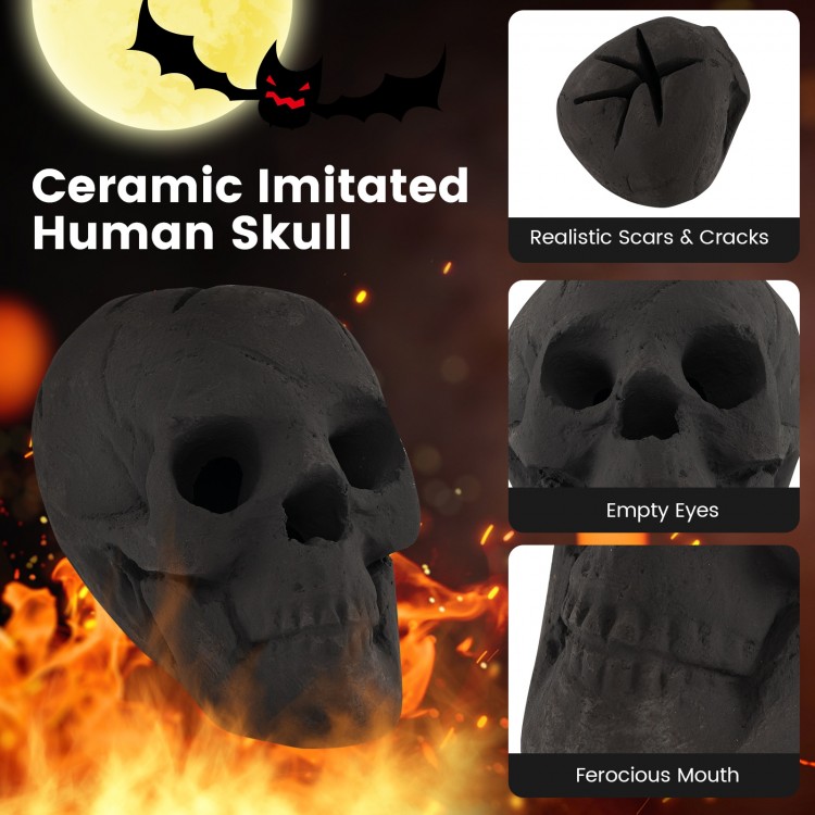 Realistic black ceramic skull decoration with spooky details, designed for fire pits, creating a creepy Halloween.